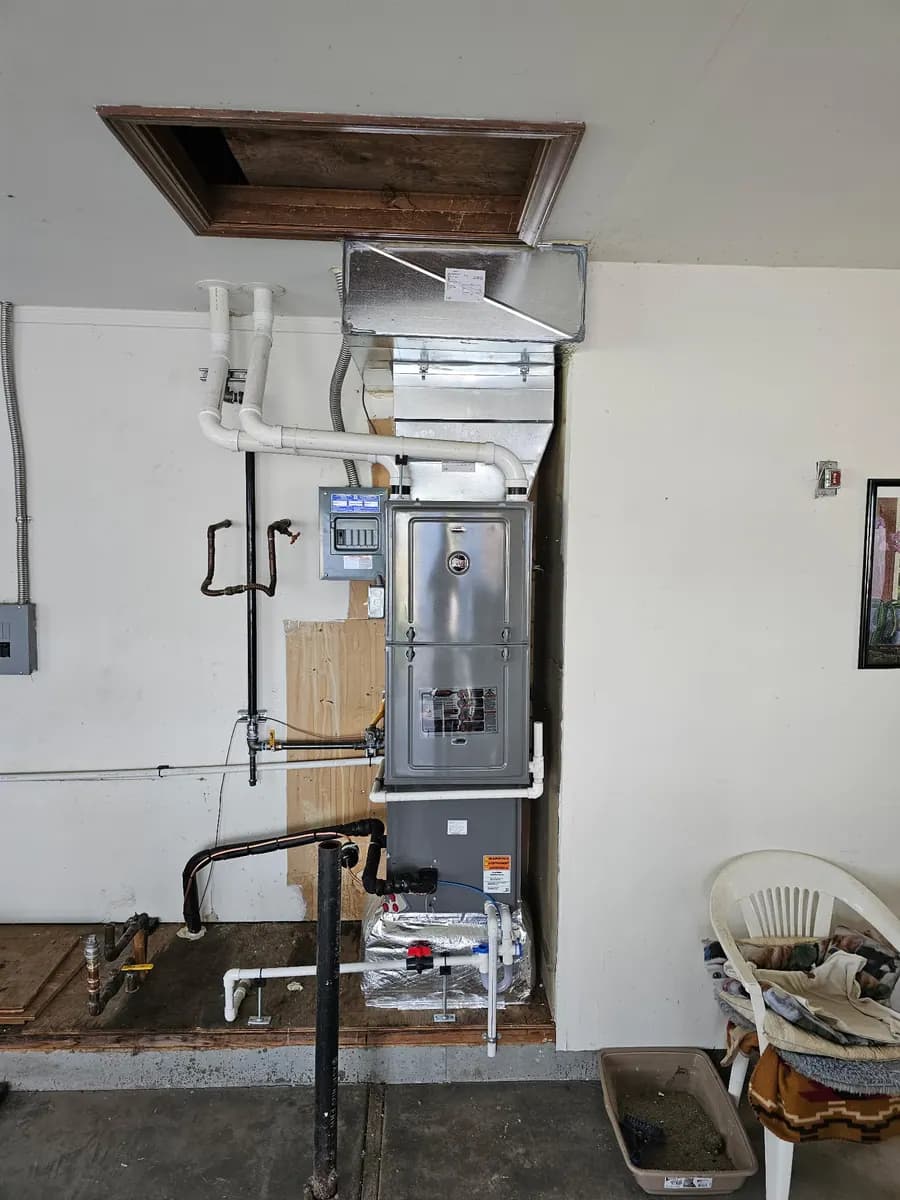 Furnace and water heater mechanical room with gas piping